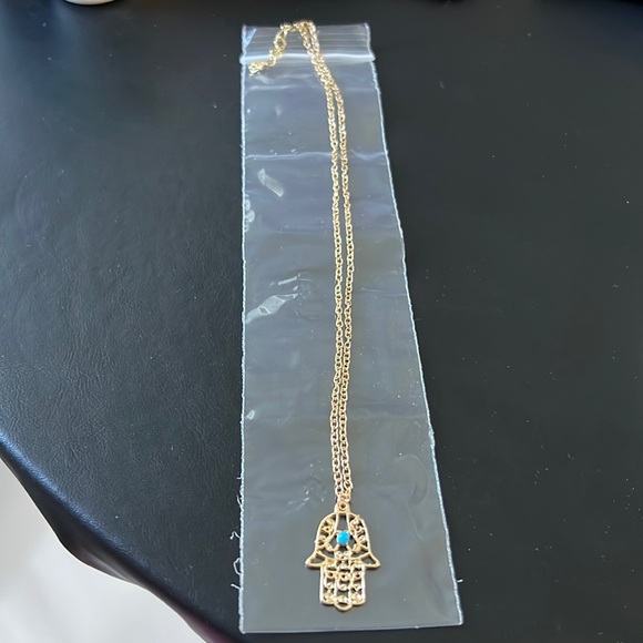 HAMSA IN GOLD TONE FILIGREE WITH A TURQUOISE COLORED STONE - Picture 6 of 8